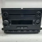 front of radio 7L3T-18C869-BK