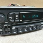 Front view OEM Chrysler Dodge Jeep RBQ Radio P05091979AF 6 disc CD changer
